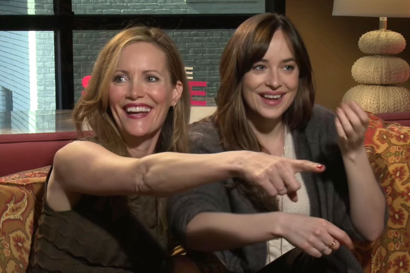Dakota Johnson and Leslie Mann Derail an Interview to Hit on a Reporter photo picture photo