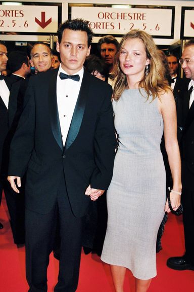 FRANCE - MAY 10:  Festival of Cannes 97: Walking up the red-carpeted steps for “The brave” in Cannes, France on May 10, 1997 - Kate Moss, Johnny Depp.  (Photo by Pool APESTEGUY/BENAINOUS/DUCLOS/Gamma-Rapho via Getty Images)