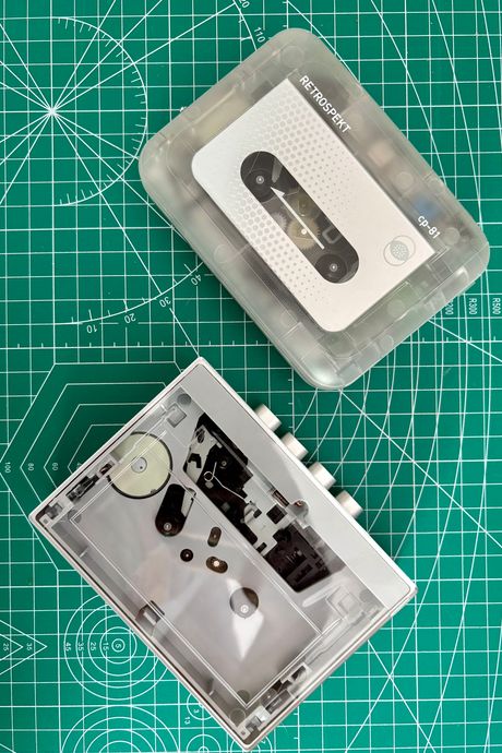 The Retrospekt and the FiiO CP13 cassette players on top of a green cutting mat.