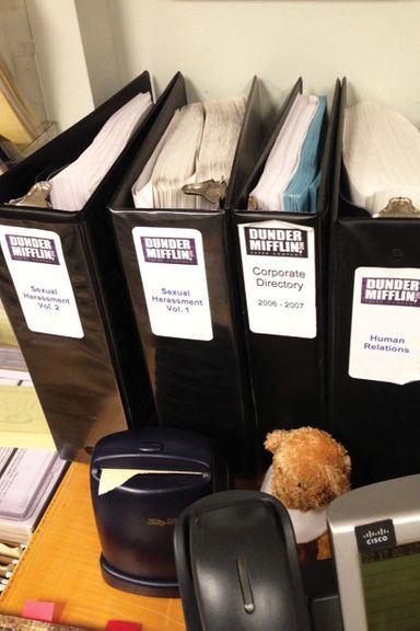 “This is also from Toby's desk. Marvel at the sheer amount of literature on Sexual Harrassment! And then go back to laughing about how Toby has a brochure on Truck and Tractor Trailer Accidents on his desk.”