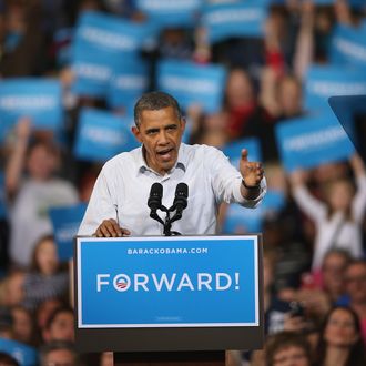 MILWAUKEE, WI - NOVEMBER 03: U.S. President Barack Obama speaks to supporters during a campaign rally at the Delta Center on November 3, 2012 in Milwaukee, Wisconsin. Wisconsin is one of nine battleground states expected to determine the outcome of Tuesday's presidential election. (Photo by Scott Olson/Getty Images)