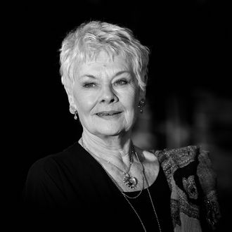 LONDON, ENGLAND - FEBRUARY 07: (EDITORS NOTE: Image has been converted to black and white) Dame Judi Dench attends the World Premiere of 'The Best Exotic Marigold Hotel' at The Curzon Mayfair on February 7, 2012 in London, England. (Photo by Gareth Cattermole/Getty Images)