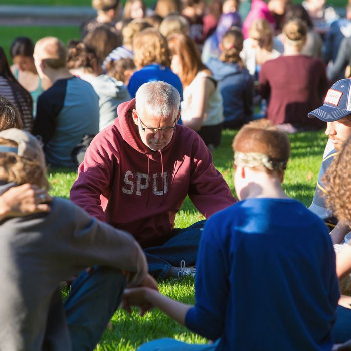 SEATTLE, WA - JUNE 05: Students mourn on campus after a shooting at Seattle Pacific University on June 5, 2014 in Seattle, Washington. A gunman is in custody after four people were shot on campus resulting in one death. (Photo by Mat Hayward/Getty Images)