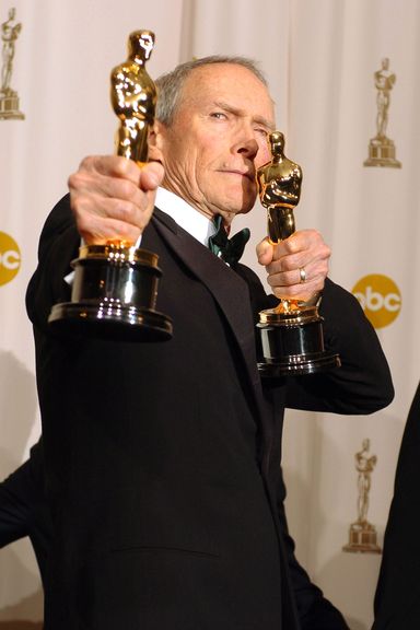 The Many Creative Ways Oscar Winners Pose With Their Trophies