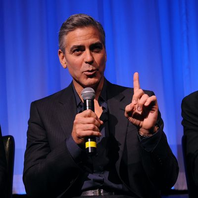 Actor George Clooney attends an official screening of 