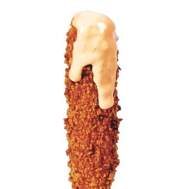 Asiadog’s tonkatsu corn dog revamps the fairground classic by dunking your choice of protein (organic beef, chicken, pork, or veggie) in a jalapeño-spiked buttermilk-cornmeal batter, then rolling it in panko bread crumbs and plunking it in the deep fryer. The grand finale: a squirt of katsu-spiked mayo. $6; 66 Kenmare St., nr. Mott St.; 212-226-8861.