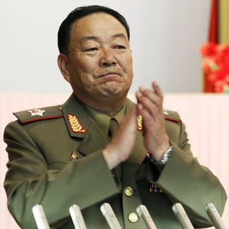 FILE - In this July 18, 2012, file photo, then Vice Marshal Hyon Yong Chol applauds during a meeting in Pyongyang, North Korea. North Korean leader Kim Jong Un ordered his defense chief Hyon Yong Chol executed with an anti-aircraft gun for complaining about the young ruler, talking back to him and sleeping during a meeting presided over by Kim, South Korea's spy agency told lawmakers Wednesday, May 13, 2015, citing what it called credible information. (AP Photo/Jon Chol Jin, File)