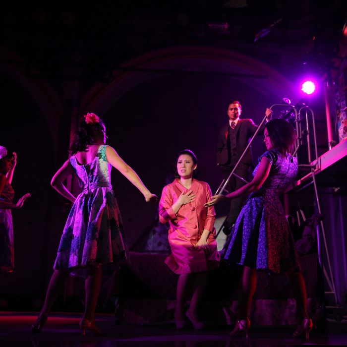 Ruthie Ann Miles (center) and the cast of Here Lies Love, with concept and lyrics by David Byrne, music by David Byrne and Fatboy Slim, additional music by Tom Gandey and J Pardo, choreographed by Anne-B Parson, and directed by Alex Timbers, running at The Public Theater at Astor Place. Photo credit: Joan Marcus