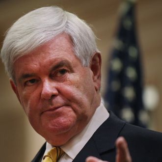 NAPLES, FL - NOVEMBER 25: Republican presidential hopeful and former Speaker of the House Newt Gingrich speaks to overflow crowds at a Hilton Hotel on November 25, 2011 in Naples, Florida. Gingrich discussed foreign policy issues and restated his position on illegal immigrants in the United States. Gingrich, who has rose in recent polls following strong debate performances, had been written off earlier this year and is now expected to do well in the Iowa caucuses in early January. (Photo by Spencer Platt/Getty Images)