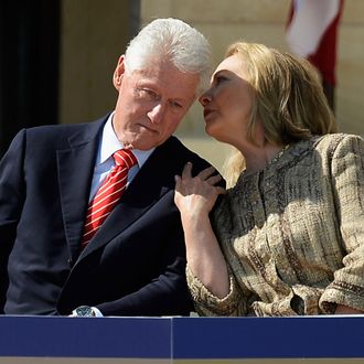 DALLAS, TX - APRIL 25: Former first lady and former Secretary of State Hillary Rodham Clinton speaks with her husband former president Bill Clinton as they attend the opening ceremony of the George W. Bush Presidential Center April 25, 2013 in Dallas, Texas. The Bush library, which is located on the campus of Southern Methodist University, with more than 70 million pages of paper records, 43,000 artifacts, 200 million emails and four million digital photographs, will be opened to the public on May 1, 2013. The library is the 13th presidential library in the National Archives and Records Administration system. (Photo by Kevork Djansezian/Getty Images)