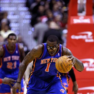 Amare Stoudemire #1 of the New York Knicks rebounds the ball against the Washington Wizards at Verizon Center on January 6, 2012 in Washington, DC. 