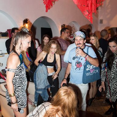 Petra Collins and the Cobra Snake at Glenn O'Brien's TV party at Casa Claridge.