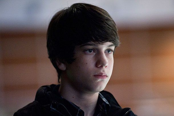 Abandoned by his dad as a baby and his detective mother on a daily basis, this 13-year-old spends his days ditching school, sneaking smokes, and being confined to a hotel room where, for some reason, he never turns on the TV. He went from not wanting to move out of Seattle at the beginning of season one to just wanting his mom to commit to something (we can only imagine how often she's dipped into his college fund to pay for all those airplane cancellation fees).
Number of times in danger: At least twice if we’re saying that drug tunnel story line happened. The other time was during the paintball outing with his friends (those things can really smart!). Also, he seems generally malnourished.
Most obvious acting-out moments:&nbsp;E-mailing Rosie Larsen’s crime-scene photos to his friends; hanging out in a drug tunnel; cutting school.
Who is to blame — parents or circumstance?&nbsp;We give twenty percent to the environment — with all this rain, who wouldn’t have some form of mild depression —&nbsp;but it’s clear that this mostly falls on the ‘rents. In the beginning, you could've made a weak case for blaming Sarah's boss, who made her stick around to handle Rosie's murder, but we always knew that was just a dumb plot device.
Likelihood of long-term psychological damage: He is probably going to turn out like his mom. She was moved around from foster home to foster home as a kid and so doesn’t know what a stable home is or how to provide it. You’d think she might at least guess, though, that it doesn’t involve a motel room. He’ll follow the same pattern.