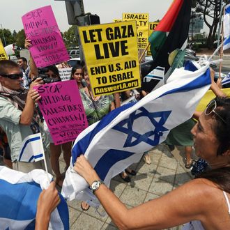 Protestors and counter-protestors shout slogans at each other during a demonstration against Israel's military operations in the Gaza Strip, August 2, 2014 in front of the Federal Building in Los Angeles, California.