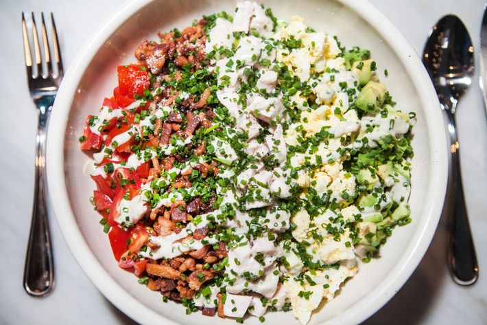 Cobb salad: chicken, bacon, egg, avocado, tomato.