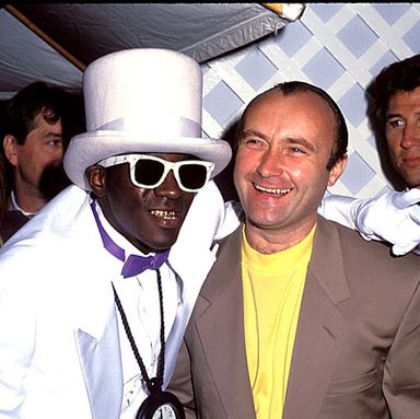 Very sadly not pictured with a glad-handing Flavor Flav and Phil Collins: MC Hammer, who later performed "U Can't Touch This" accompanied by an estimated one million people.