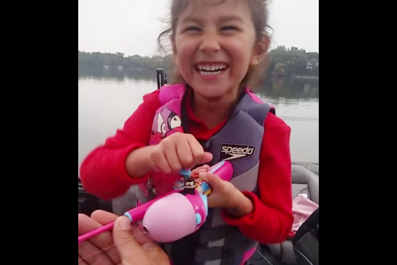 Little Girl Expertly Catches a Giant Bass Using Her Barbie Fishing
