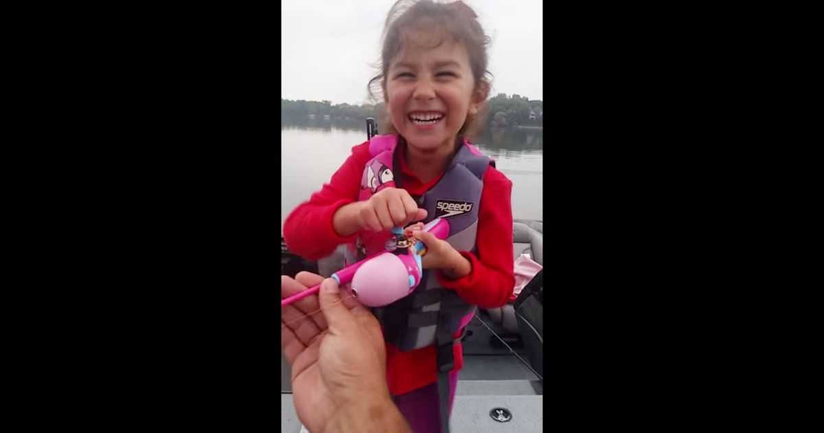 Little Girl Expertly Catches a Giant Bass Using Her Barbie Fishing