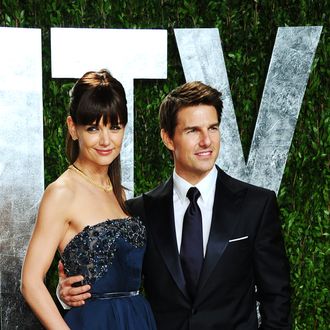 Actors Katie Holmes and Tom Cruise arrive at the 2012 Vanity Fair Oscar Party hosted by Graydon Carter at Sunset Tower on February 26, 2012