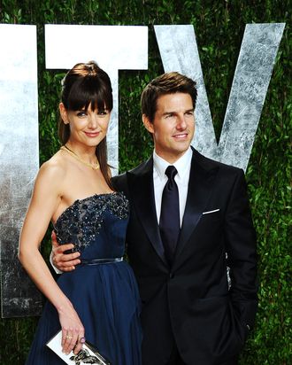 Actors Katie Holmes and Tom Cruise arrive at the 2012 Vanity Fair Oscar Party hosted by Graydon Carter at Sunset Tower on February 26, 2012