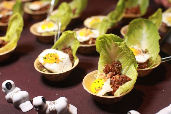 Tao's Minchi lettuce cups and Portuguese egg tarts.