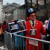 Supporters of US President-elect Donald Trump wait outside for a MAGA victory rally at Capital One Arena in Washington, DC, on January 19.