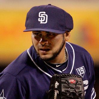 Pitcher Alex Torres #54 of the San Diego Padres wearing a protective cap prepares to throw the ball in the 6th inning of the game against the Arizona Diamondbacks at Petco Park on June 28, 2014 in San Diego, California. 