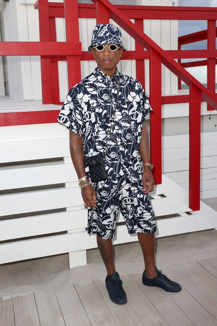 Pharrell Williams Rocket Williams and Helen Lasichanh attend the Sacai, WireImage