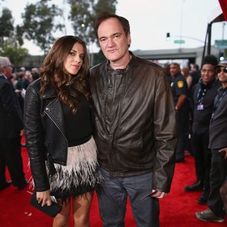 LOS ANGELES, CA - JANUARY 26: Director Quentin Tarantino (R) and guest attend the 56th GRAMMY Awards at Staples Center on January 26, 2014 in Los Angeles, California. (Photo by Christopher Polk/Getty Images for NARAS)