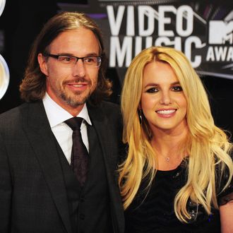 Jason Trawick (L) and Britney Spears arrive at the 2011 MTV Video Music Awards (VMAs) August 28, 2011 at the Nokia Theatre in downtown Los Angeles, California. AFP PHOTO / Frederic J. Brown (Photo credit should read FREDERIC J. BROWN/AFP/Getty Images)