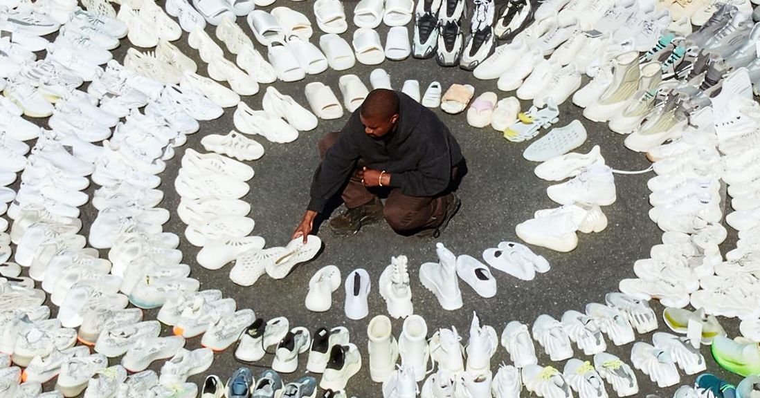 Kanye West Poses With All His Yeezy Shoes