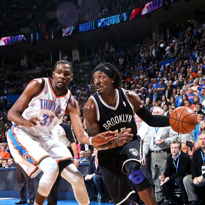 Gerald Wallace #45 of the Brooklyn Nets drives against Kevin Durant #35 of the Oklahoma City Thunder on January 2, 2013 at the Chesapeake Energy Arena in Oklahoma City, Oklahoma.