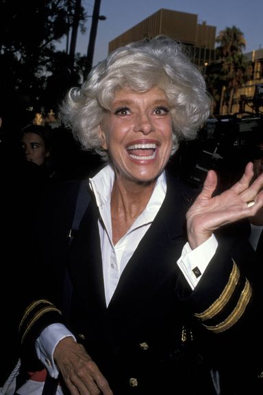 Because a movie-premiere photo gallery isn't a movie-premiere photo gallery unless it begins with Carol Channing waving hello in a Captain Stubing–style dinner jacket. Hello, Dolly!