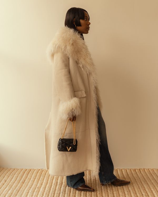 Big puffy hot sale fur coat