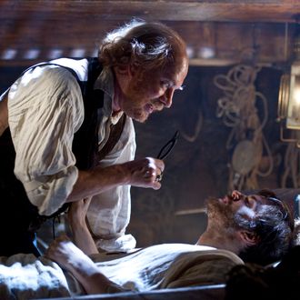 (L-r) TOM HANKS as Dr. Goose and JIM STURGESS as Adam Ewing in the epic drama “CLOUD ATLAS