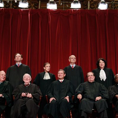 WASHINGTON - SEPTEMBER 29: Members of the US Supreme Court pose for a group photograph at the Supreme Court building on September 29, 2009 in Washington, DC. Front row (L-R): Associate Justice Anthony M. Kennedy, Associate Justice John Paul Stevens, Chief Justice John G. Roberts, Associate Justice Antonin Scalia, and Associate Justice Clarence Thomas. Back Row (L-R), Associate Justice Samuel Alito Jr., Associate Justice Ruth Bader Ginsburg, Associate Justice Stephen Breyer, and Associate Justice Sonia Sotomayor. (Photo by Mark Wilson/Getty Images) *** Local Caption *** Sonia Sotomayor;Stephen Breyer;Ruth Bader Ginsburg;Samuel Alito Jr.;Clarence Thomas;John G. Roberts;John Paul Stevens;Anthony M. Kennedy