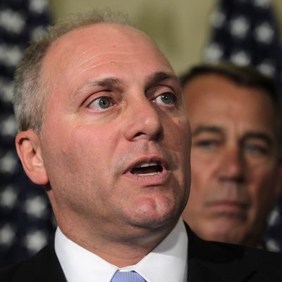 WASHINGTON, DC - JUNE 19: U.S. Rep. Steve Scalise (R-LA) (L) speaks to members of the media as Speaker of the House Rep. John Boehner (R-OH) (R) listens after a leadership election at a House Republican Conference meeting June 19, 2014 on Capitol Hill in Washington, DC. House GOPs have picked Majority Whip Rep. Kevin McCarthy (R-CA) as the new House majority leader and Scalise as the new majority whip. (Photo by Alex Wong/Getty Images)