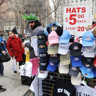 A street vendor sells hats and other items near Battery Park in lower Manhttan March 11, 2010 in New York.