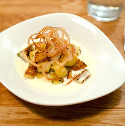 Gnocchi Romana with cipollini onions, truffle cream, and crispy onions.