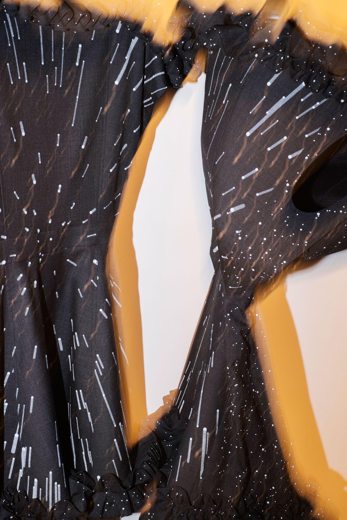 See Clothes That Transform With a Camera’s Flash