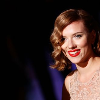 MILAN, ITALY - SEPTEMBER 25: Actress Scarlett Johansson attends the Dolce & Gabbana Spring/Summer 2012 fashion show as part Milan Womenswear Fashion Week on September 25, 2011 in Milan, Italy. (Photo by Vittorio Zunino Celotto/Getty Images)