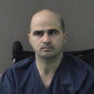 In this photo released by the Bell County Sheriff's Office, U.S. Maj. Nidal Hasan, the Army psychiatrist who is charged with nurder in the Fort Hood shootings, is seen in a booking photo after being moved to the Bell County Jail on April 9, 2010 in Belton, Texas. Hasan was transferred early April 9, 2010 from Brooke Army Medical Center in San Antonio to Bell County Jail in Belton, Texas. 