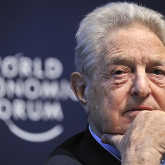 A Hungarian-American financier George Soros looks on during a session entitled 