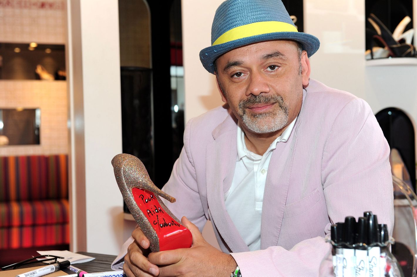 Christian Louboutin Files New Lawsuit Over Red Sole, Sneaker