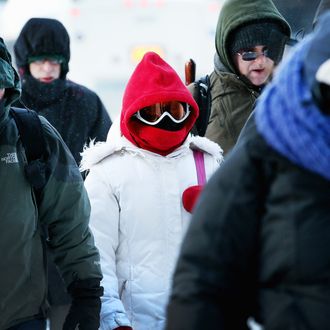 Commuters make a sub-zero trek to offices in the Loop on January 6, 2014 in Chicago, Illinois. Temperatures in the city dipped to -16 degree Fahrenheit this morning on the heals of a polar vortex that has swept into the Midwest bringing with it dangerously cold temperatures not seen in the area in about 20 years. 