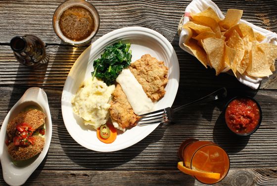 Chicken Fried Steak: Not technically Tex-Mex but too good to leave off the menu: pounded top round, breaded and fried, served with black pepper cream gravy, smashed potatoes, sautéed spinach, and escabeche.