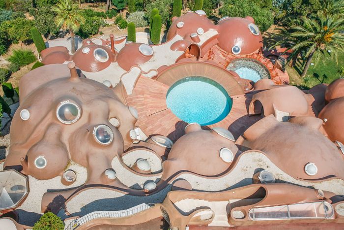 The bubble-shaped mass tumbles down the hillside. (Photo: Jean-Patrick DEYA/Gamma-Rapho via Getty Images)