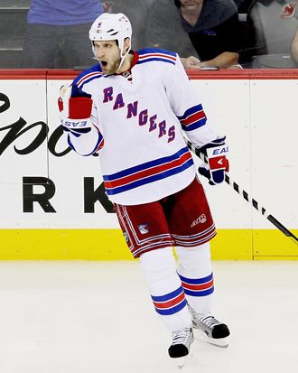 Dan Girardi #5 of the New York Rangers celebrates a third period goal in Game Three of the Eastern Conference Final against the New Jersey Devils during the 2012 NHL Stanley Cup Playoffs at the Prudential Center on May 19, 2012 in Ne