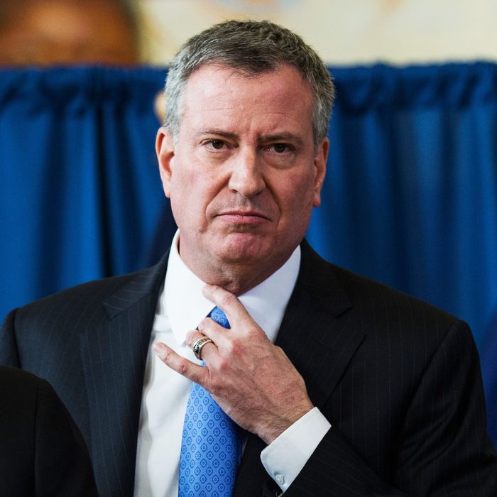 New York City Mayor Bill DeBlasio attends a press conference to announce the city will not appeal a judge's ruling that the police tactic 