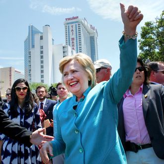 US Democratic presidential candidate Hillary Clinton waves to Members of the Atlantic City casino workers union members outside the Taj Mahal Casino after a event in Atlantic City, New Jersey, on July 6, 2016.